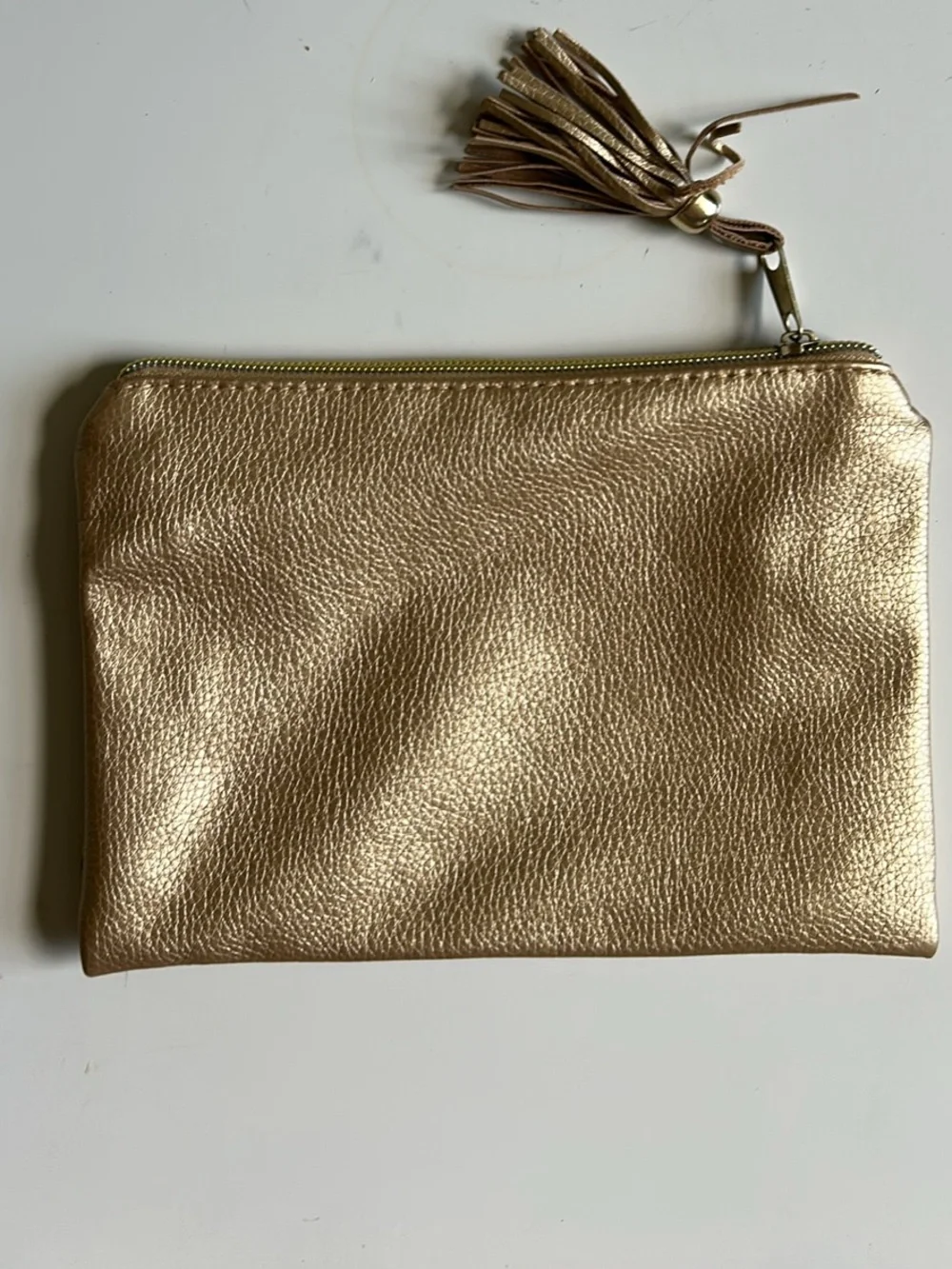 Metallic Gold Wristlet Clutch with Tassel Accent